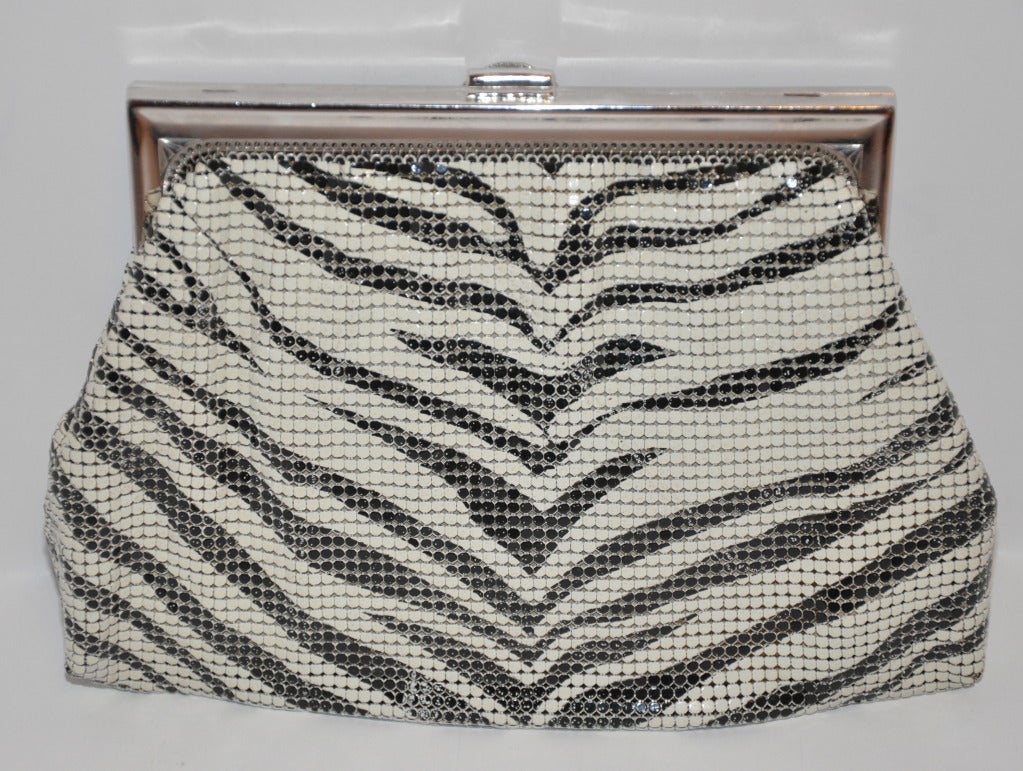 Whiting & Davis black and white animal-striped hardware mesh handbag measures 6