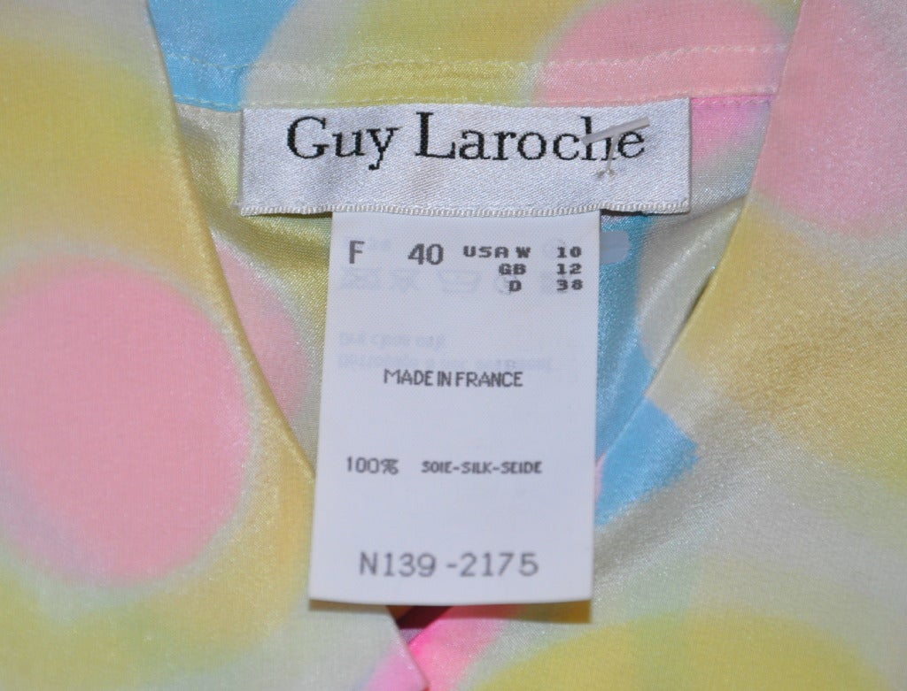 Guy Laroche multi-pastel color silk button-down blouse has their signature gilded gold buttons with 