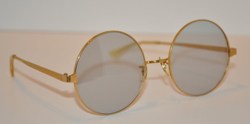 These huge round-framed glasses are 1/20 12K gold filled. 
Glasses measures 2 1/4