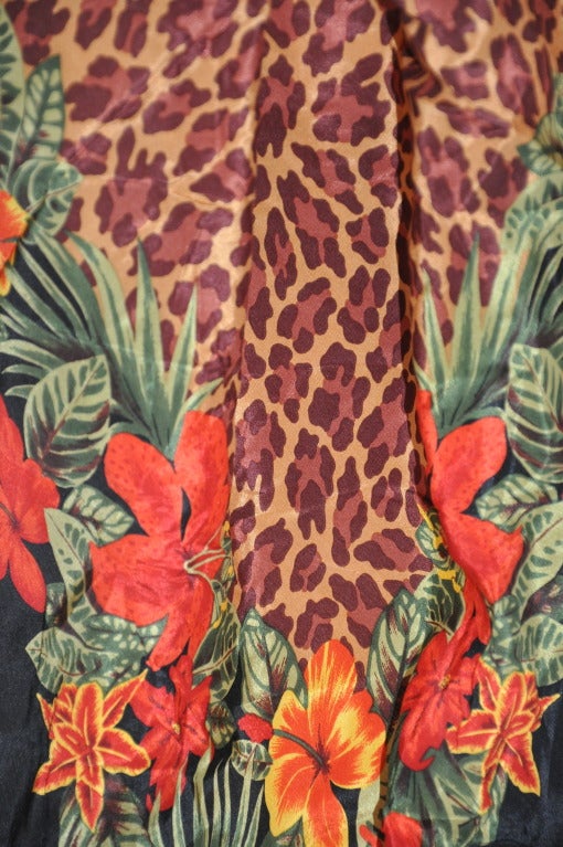 This wonderful bold jungle with floral print silk scarf measures 30