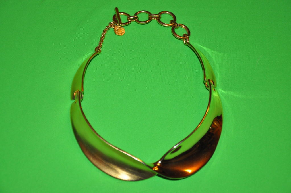 Clara Studio for'Asymmetry' (marked 1994, and signed) necklace is one half gilded, one half polished.