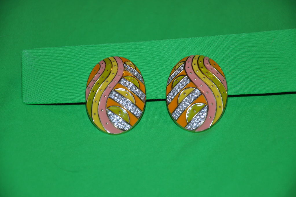 Guy Laroche enamel with Swarovski crystals. the enamel are in colors of yellow, green, pink, tangerine, accented with the Swarovski crystals. The earrings are signed on the back.