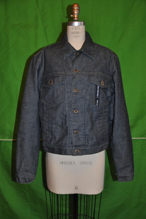 Moschino Men's denim jacket. Front length measures 20 1/2