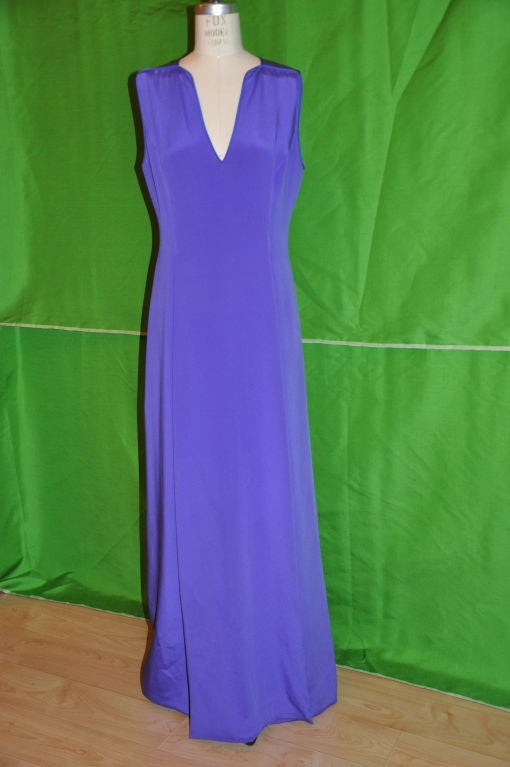 Pilar Rossi Couture Violet evening gown has a front panel set over the center front slit. The front slit measures 25 1/2