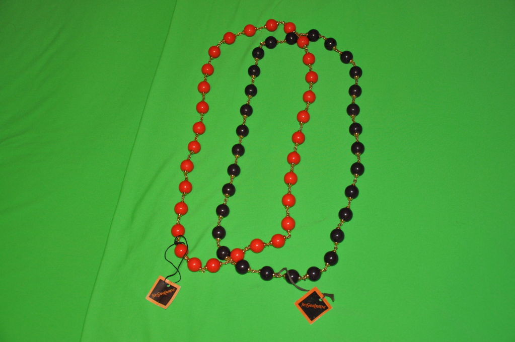 Red Set of two Yves Saint Laurent necklaces For Sale