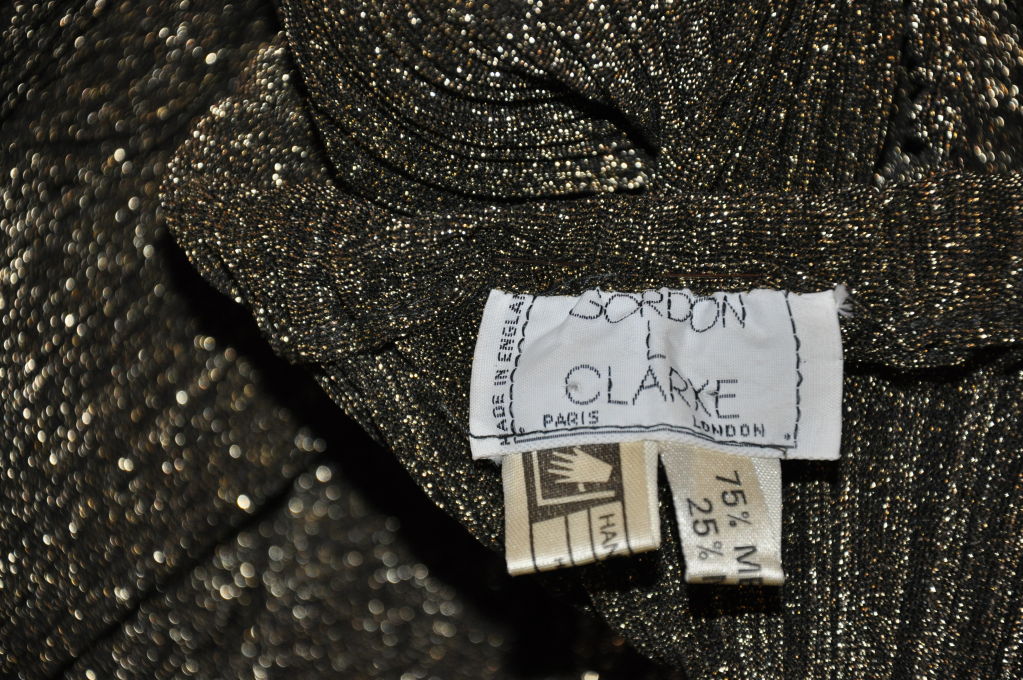 Donna Gordon L. Clarke (Inghilterra) gonna in lamé elasticizzato oro/nero in vendita
