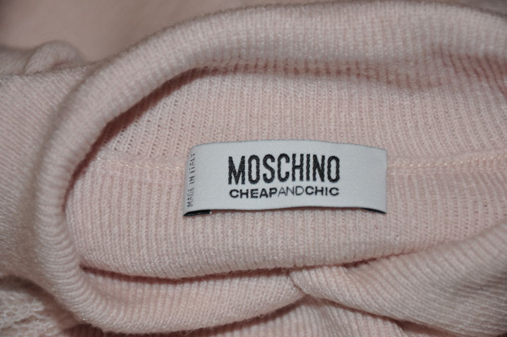 Gray Moschino powdered pink sweater