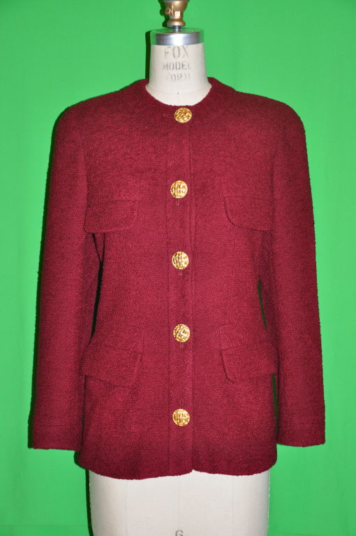 Chanel Burgundy wool boucle jacket has five (5) gilded gold metal detailed buttons measuring 1 1/8