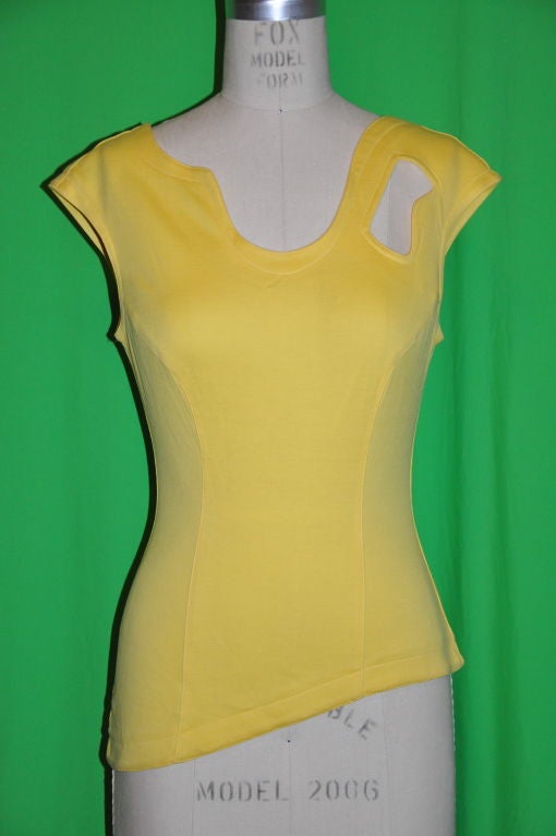 Thierry Mugler Asymmetric yellow cotton tee has a back center zipper measuring 10 1/4