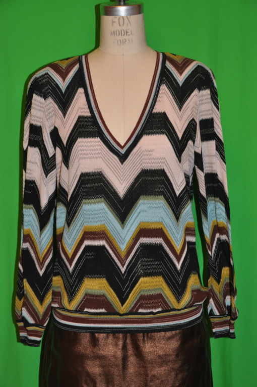 Missoni Multicolored V-neck pullover sweater with slightly padded shoulders.
Front measures 15