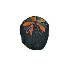 Yves Saint Laurent Rive Gauche wool skull cap with tassel