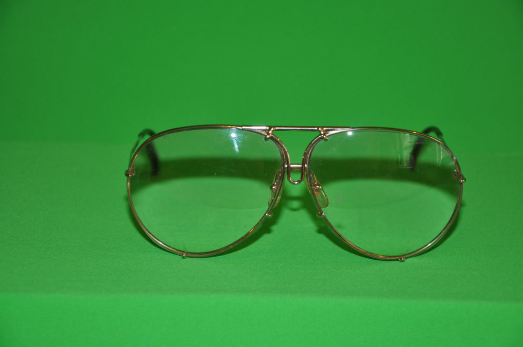 These Carrera frames are of 18 carat and comes with the original tinted lens. The front height of the frames are 2 1/2