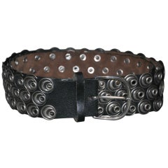 Saks Fifth Avenue Black leather with silver detailed disks belt.