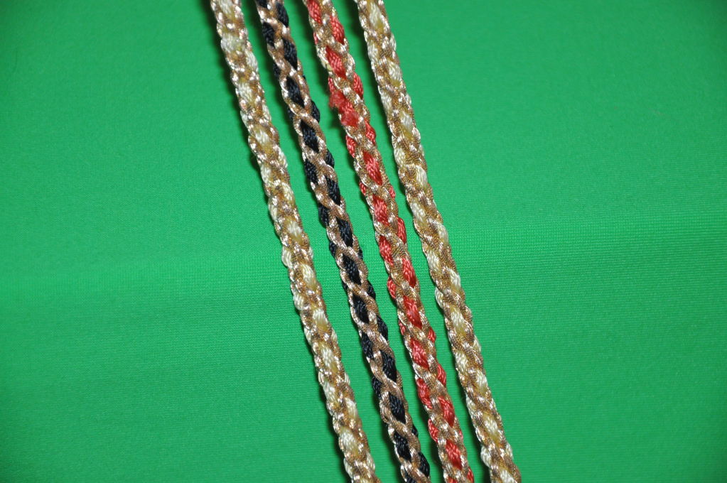 Attributed to Yves Saint Laurent 4 metallic woven belts 1