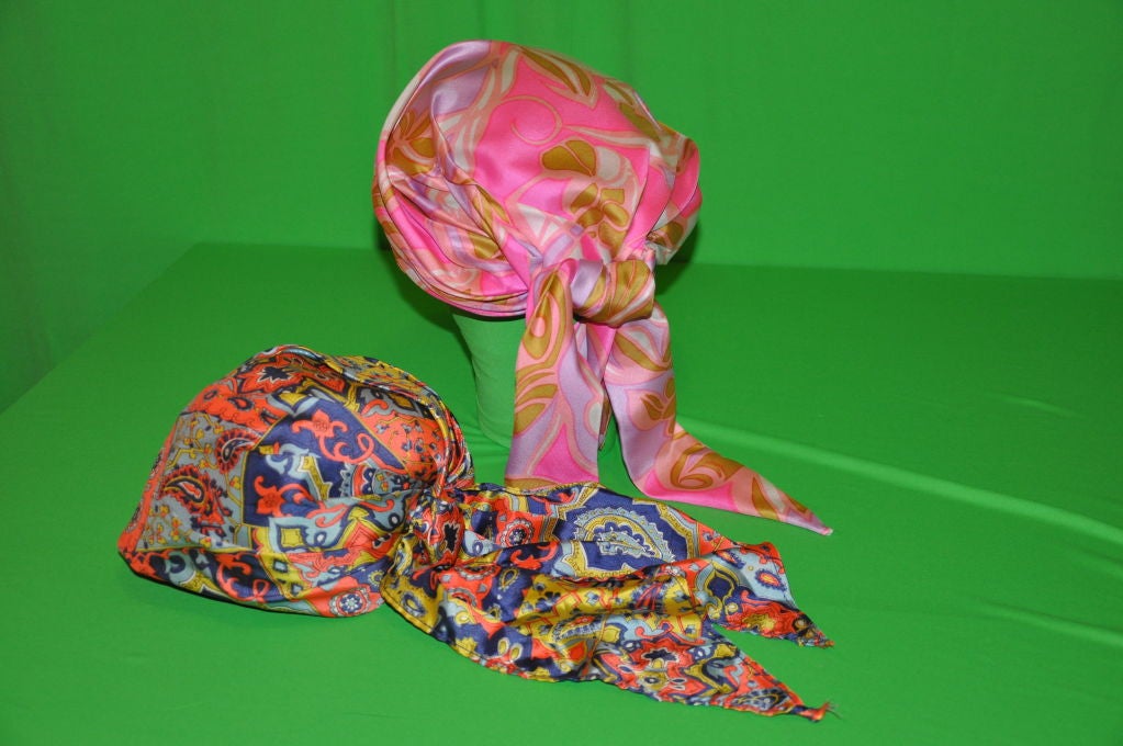 Set of two multicolored silk turbans which can be adjusted and tied at the back.