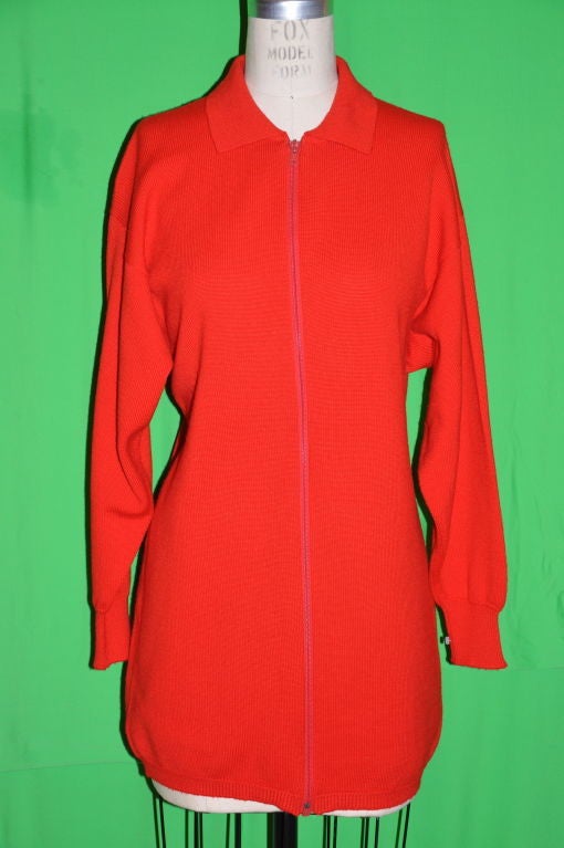 Rare,early Michael Kors for Lyle & Scott red merino wool knit zippered jacket is of medium weight. The collar stands at 3