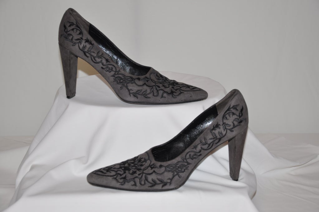 Stephane Kelian gray suede pumps with hand-done embroidered detailing in black silk cord. Heels are 3 3/4