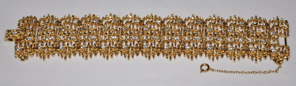 This vermeil finished gilded gold hardware bracelet is designed in 