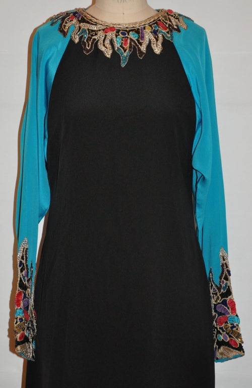 Ann Lawrence Turquoise and black gown is heavily accented with the iconic 