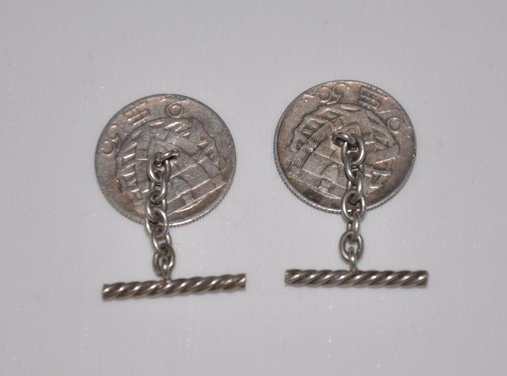 These vintage silver cuff links with Portuguese sails measures 3/4