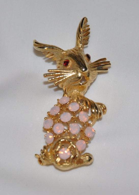 Este maravilloso broche 