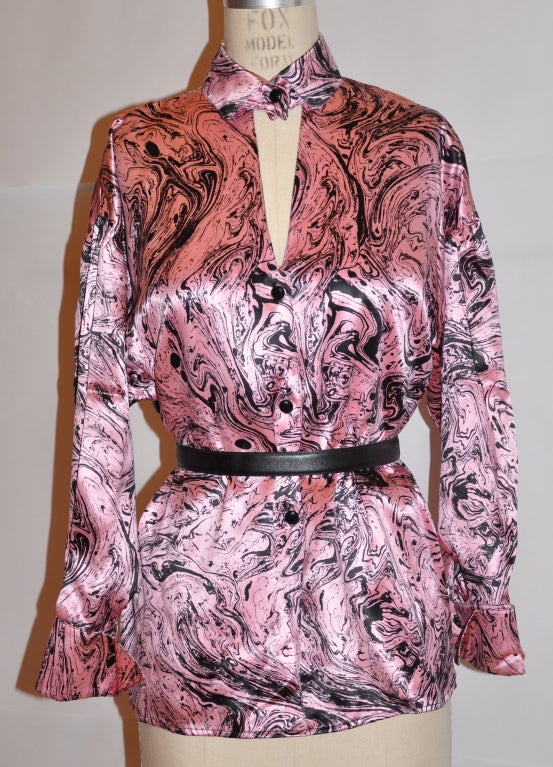 Charles Jourdan Pink & Black silk satin blouse has a single button on collar which darlingly opens up to another row of three buttons front. The drop-shoulder sleeves have a domain cut. The French cuffs can be worn folded back, or straight, and has