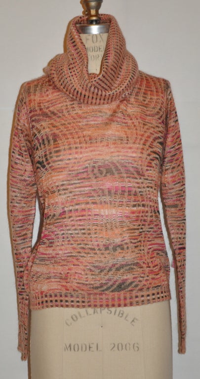 Missoni multi-colored in peach hues mohair blend turtleneck has an extra long turtleneck measuring 15 1/2