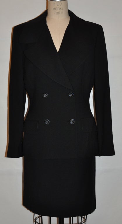 Dolce & gabbana Navy spring crepe double-breasted skirt suit is fully lined with two (2) set-in pockets in front. The buttons have their signature 