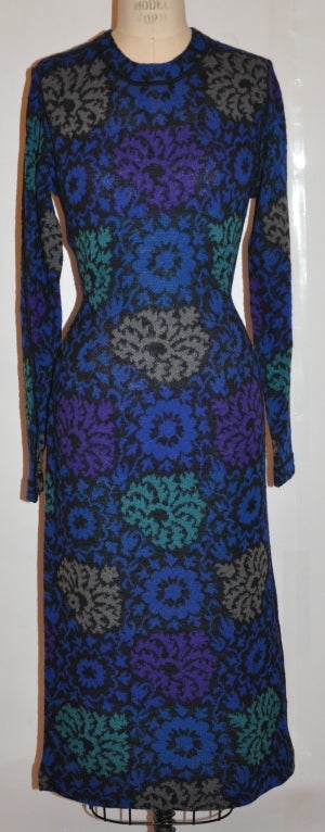 This Missoni floral print knit dress are in colors of black, blues, grays, greens and plums. Wool-blend with a hint of nylon for stretch and comfort.
  The front measures 42 3/4