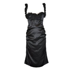 Roberto Cavalli black body-hugging cocktail dress with ruffles