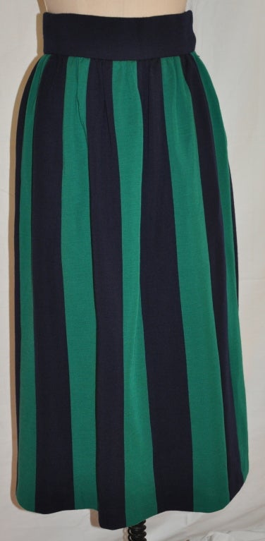 Norman Norell fully lined skirt styled with panels of navy & green. Each panel measures 2 3/4