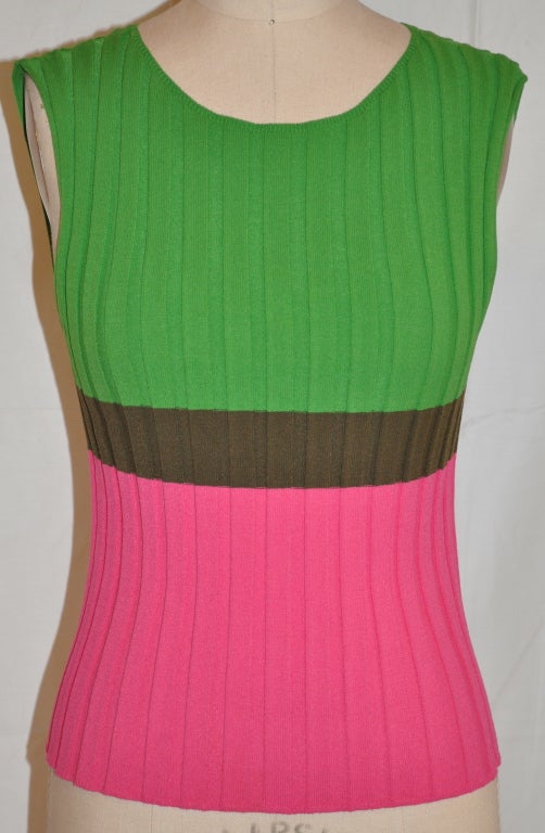 Issey Miyake tank has colors of green, pink and olive.
   The front length is 18