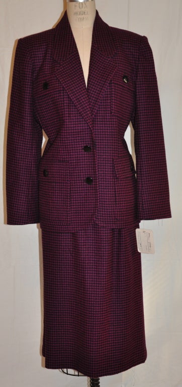 Pierre Balmain suit ensemble is fully lined with silk. 
   The jacket is safari style with four (4) patch pockets. The full length of the jacket measures 26 1/2