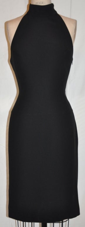 Anna Molonari black cocktail dress has an open back feature. The back length measeures 30 3/4