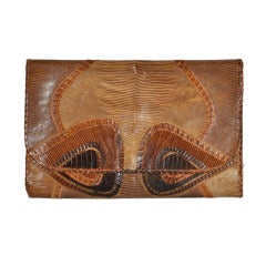 Pochette patchwork in lucertola Carlos Falchi