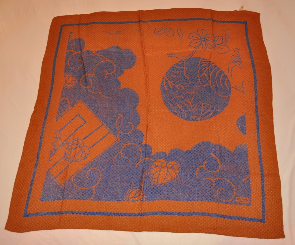 Lanvin's textured silk scarf measures 34