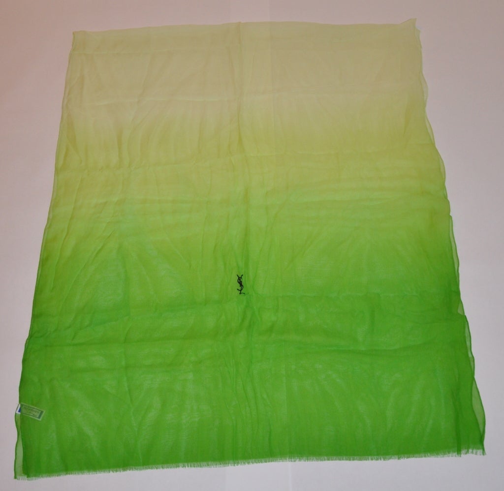Yves Saint Laurent signature huge silk chiffon shawl scarf have multi-shades of greens. The silk chiffon shawl measures 30