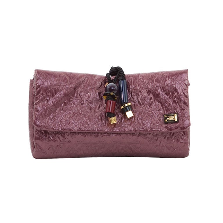 Limelight leather clutch bag Louis Vuitton Purple in Leather