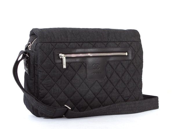 This is an authentic CHANEL Crossbody Denim Quilted Messenger Bag Medium. It is done in denim and classic black leather. This bag features a quilted front flap with a flat zip pocket, Chanel embossed logo, and a single adjustable denim strap. The
