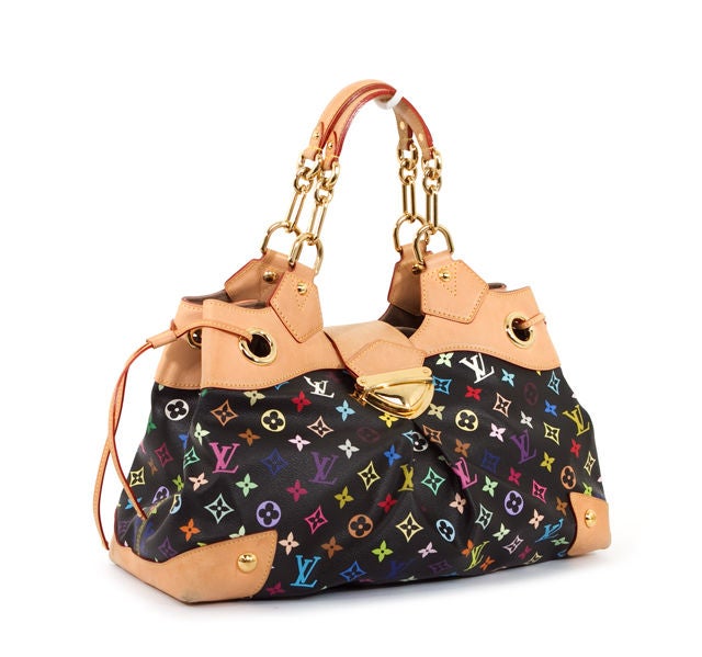 This is an authentic Louis Vuitton Ursula Black Multicolor GM Bag. It is done in signature Louis Vuitton black multicolor monogram coated canvas designed by Takashi Murakami. The bag has vachetta leather trim and golden brass hardware. It features