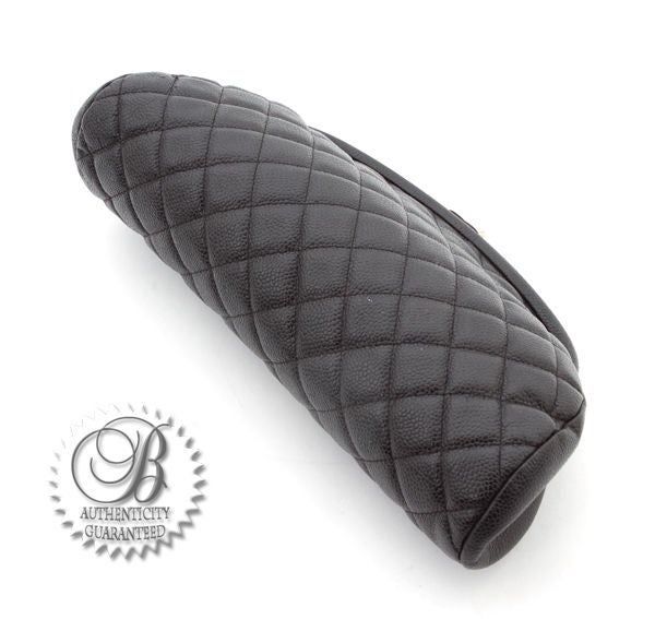 This is an authentic CHANEL Timeless Classic Caviar Black Clutch Bag. It is done in signature Chanel black caviar leather. This bag is a stunning classic! It features a “CC” silver hardware clasp. The timeless clutch is spacious enough for your