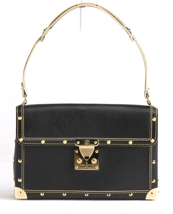 This is an authentic Louis Vuitton L'Aimable Suhali Leather Bag. Done in luxurious black Suhali goat leather, this bag's exterior features a flap closure with the signature Louis Vuitton Suhali S-lock and has structured edges lined with elegant gold