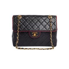 CHANEL Black Lambskin Quilted Medium Flap Bag with Trim