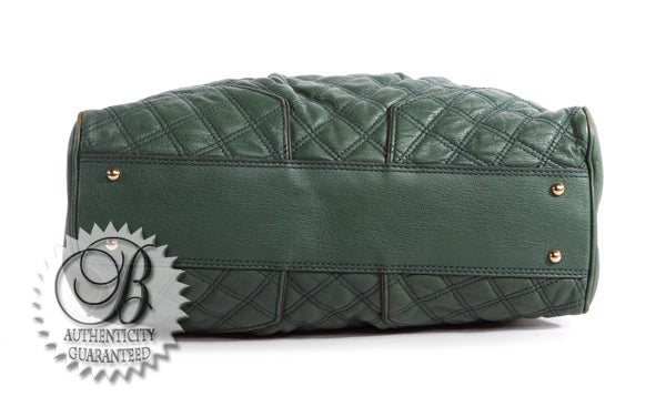 green quilted purse