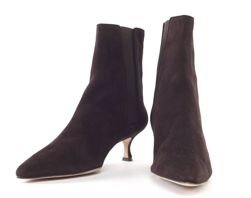 This is an authentic pair of Manolo Blahnik Brown Suede Ankle Boots. They are bootie height coming up about 2.5