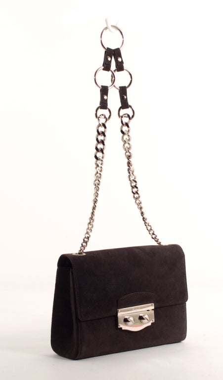 This is an authentic YSL Yves Saint Laurent Gray Suede Flap Bag with Long Chain Strap. Also known as the 