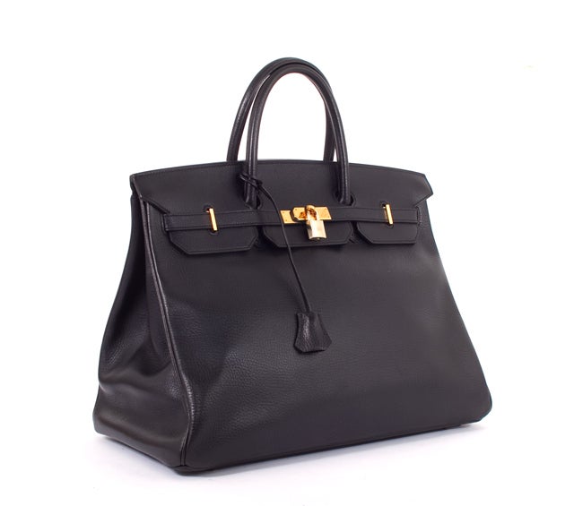 This is an authentic HERMES Black Ardennes Birkin 40 cm w GHW Handbag Shopper Classic Bag. It is done in gorgeous Hermes Ardennes Black leather with gold hardware. The bag features doubled rolled leather handles and the signature Hermes leather draw