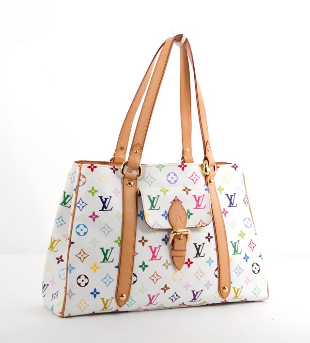 This is an authentic Louis Vuitton White Multicolor Monogram Aurelia Tote Bag. It is done in a colorful, fun variation of signature LV monogram coated canvas with vachetta leather trim and gold tone hardware. It features two flat natural leather