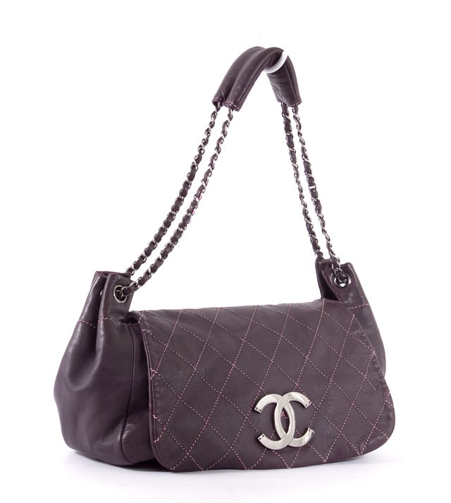 This is an authentic CHANEL Eggplant Accordion Diamond Stitch Flap Bag Handbag. It is done in smooth and supple leather in an eggplant hue with silver toned hardware and a signature Chanel stitch quilted flap closure. It features a dual connected
