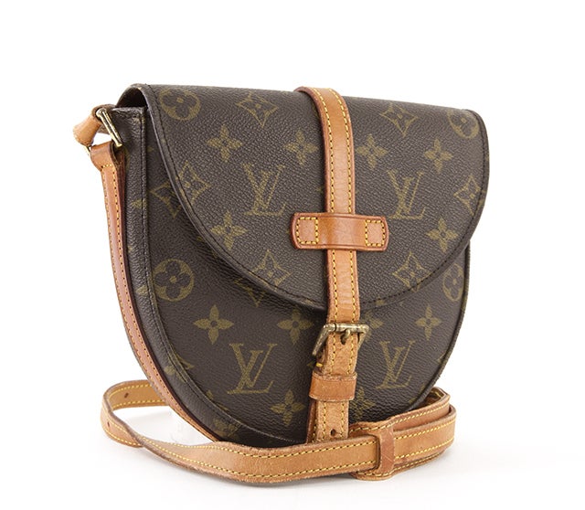 This is an authentic Louis Vuitton Chantilly PM Crossbody Bag. Done in the traditional LV monogram canvas, the bag has golden brass hardware and natural vachetta leather trim. It is a traditional crossbody or shoulder style purse, one of the more